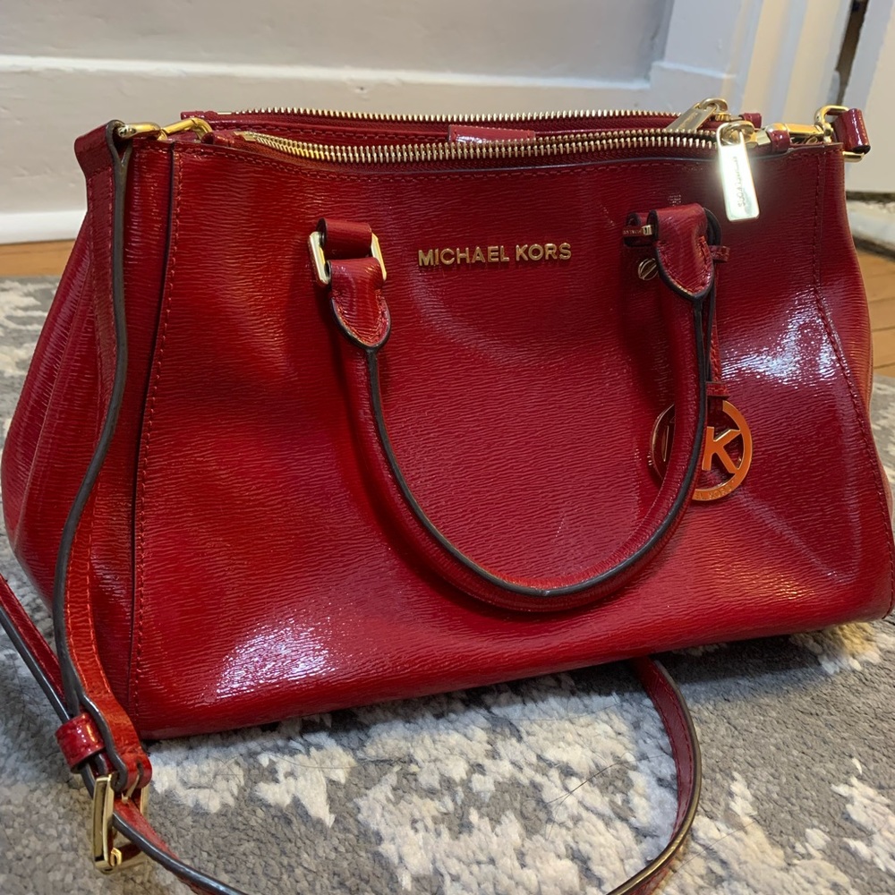 Perfect condition red patent MK satchel